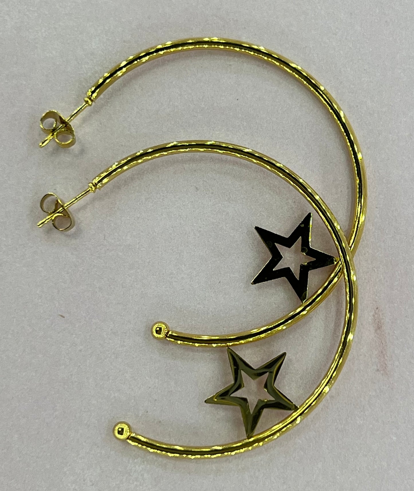 Aretes tipo Aro con estrellas